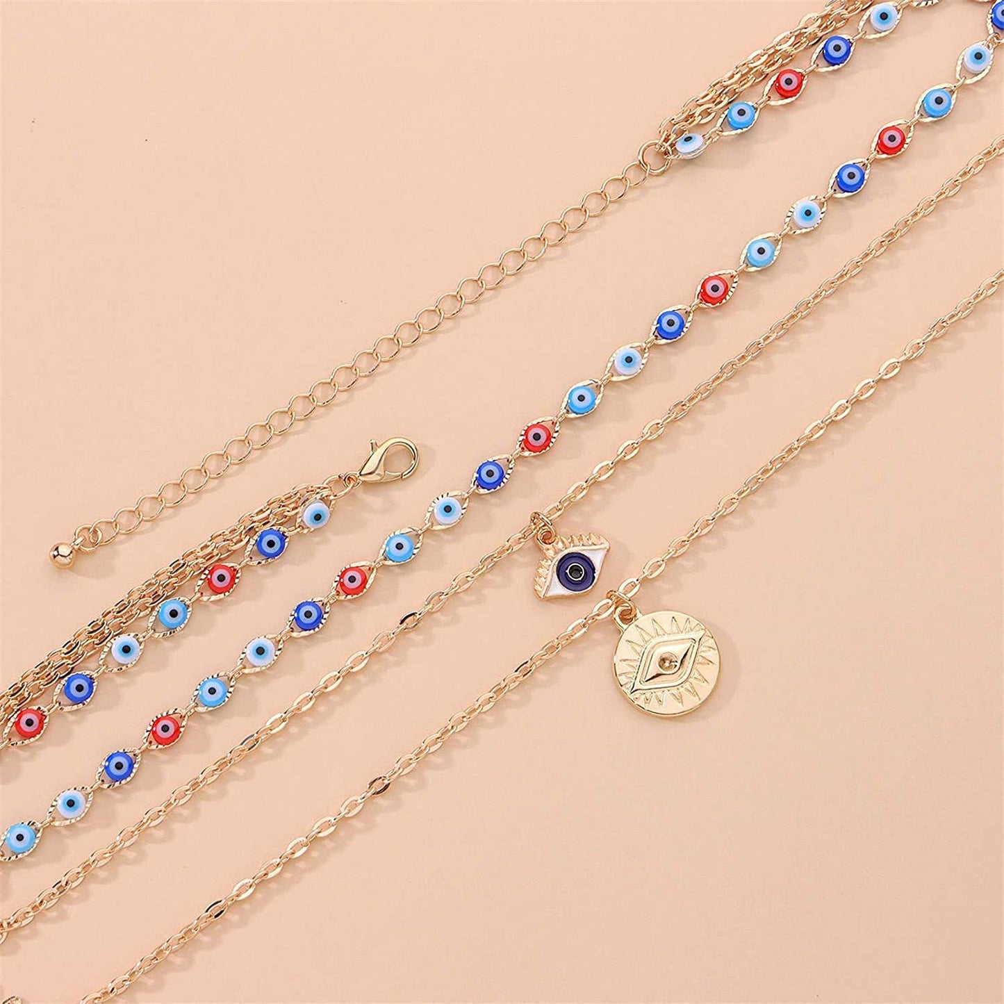 3 Layer Evil Eye Necklace Pendant With A Multi Layered Gold Chain To Wear As A Layered Nazar Necklace