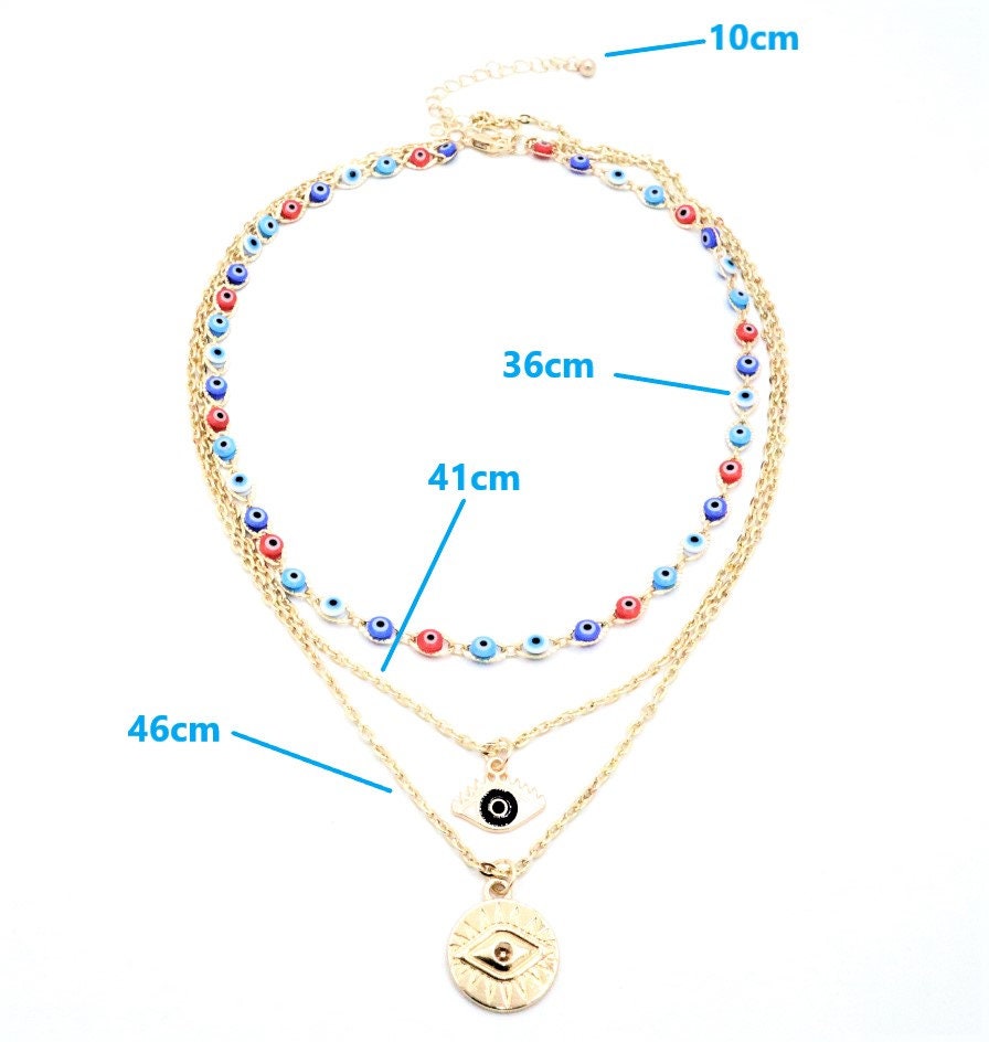 3 Layer Evil Eye Necklace Pendant With A Multi Layered Gold Chain To Wear As A Layered Nazar Necklace
