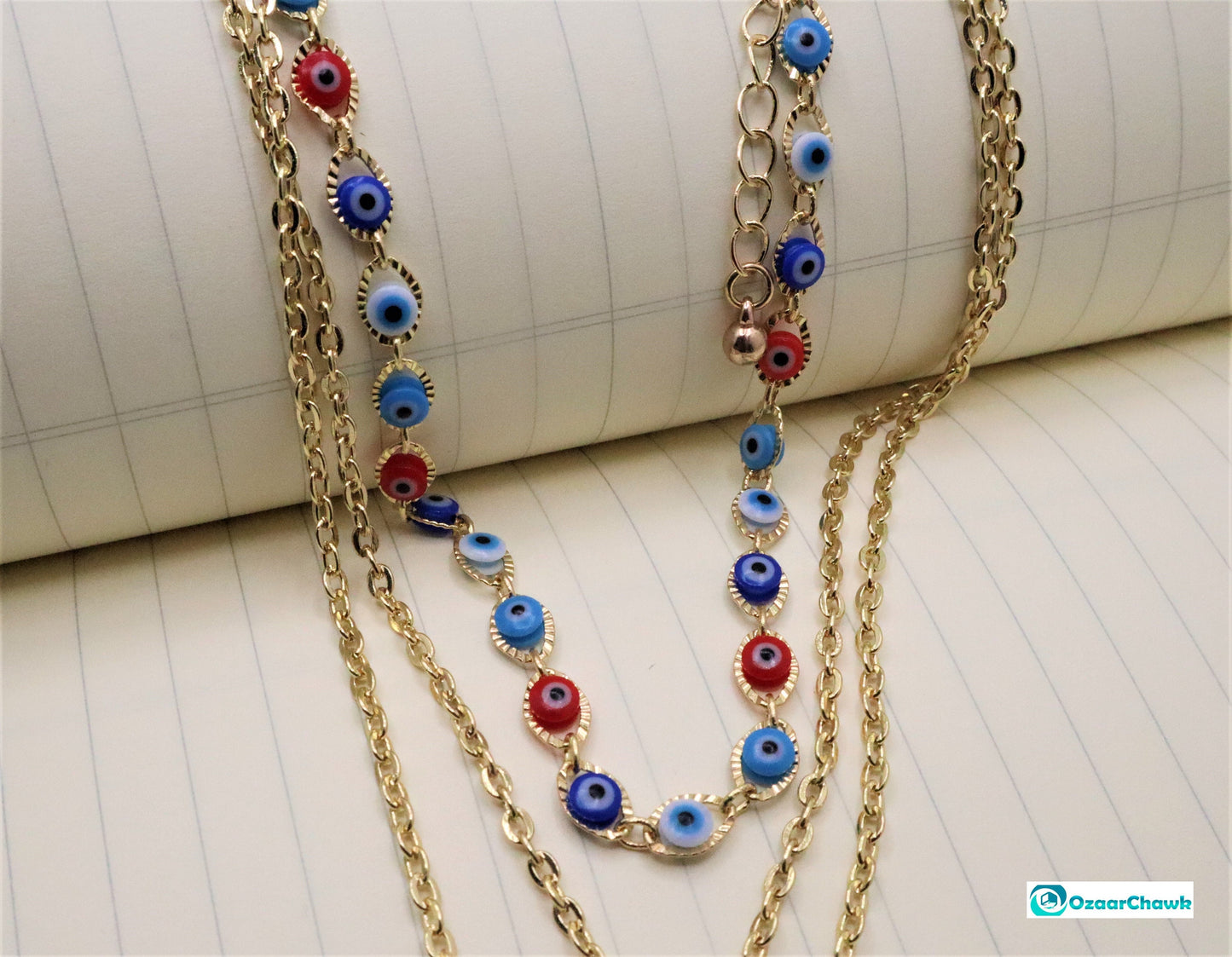 3 Layer Evil Eye Necklace Pendant With A Multi Layered Gold Chain To Wear As A Layered Nazar Necklace