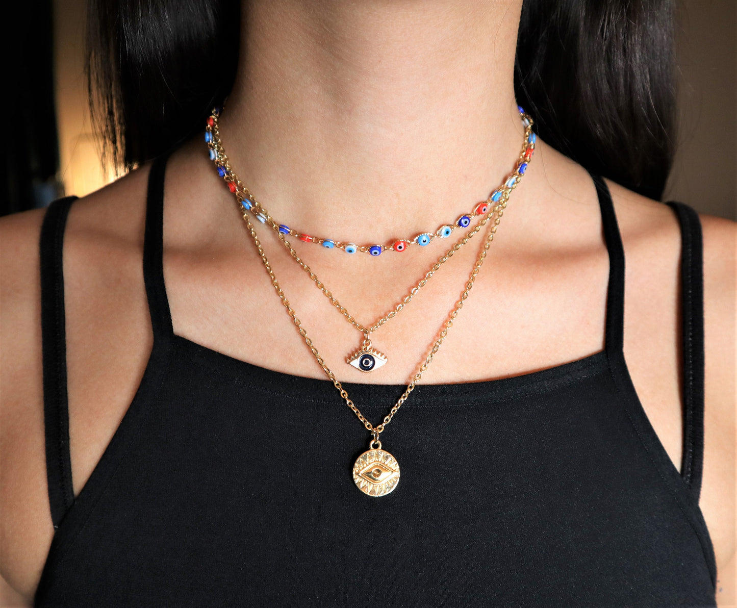 3 Layer Evil Eye Necklace Pendant With A Multi Layered Gold Chain To Wear As A Layered Nazar Necklace